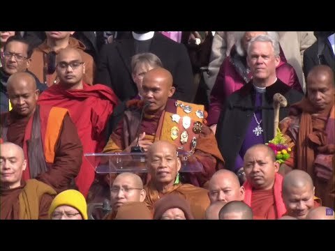 Buddhist monks speak at the National Cathedral in Washington