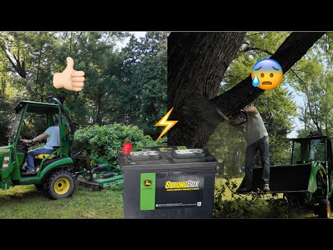 John Deere 1025R: Battery replacement and giving a zero turn a run for it's money with a brush hog