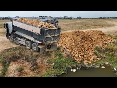 Process great work !! Land filling by Huge trucks Dumping soil & push by KomatSu Dozer