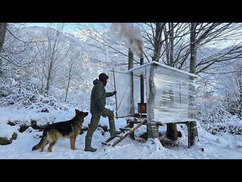 The Invisible Hut: Winter Camping with My Dog