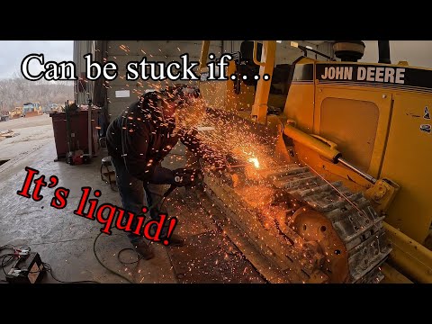 Freeing up frozen track links on a John Deere dozer required some big tools!