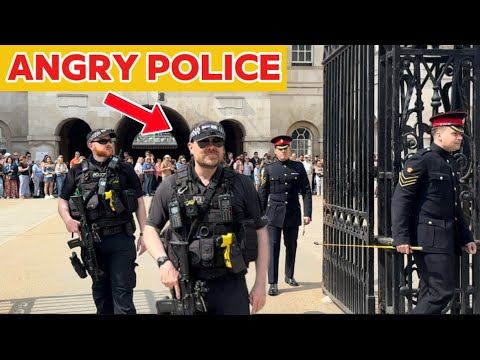 ANGRY Armed Police officer SHUT DOWN these IGNORANT tourists at the Horse Guards