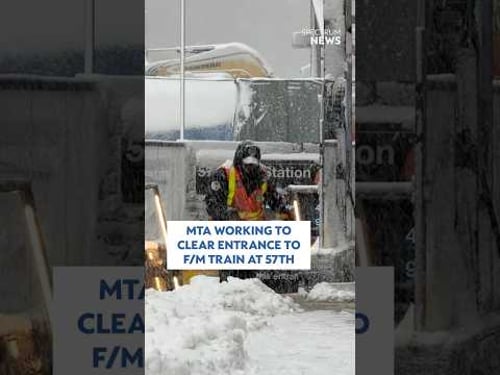 MTA working to clear entrance to F/M train at 57th