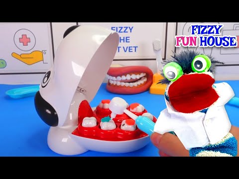 Fizzy the Pet Vet Helps Clean a Puppy's Teeth