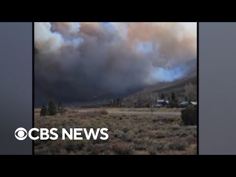 California wildfire forces evacuations and storms trigger mudslides concerns