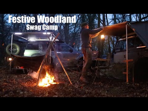 Festive Woodland Camp with Kent Survival. Christmas Dinner Cooked in a Ground Oven. Canvas Swags.