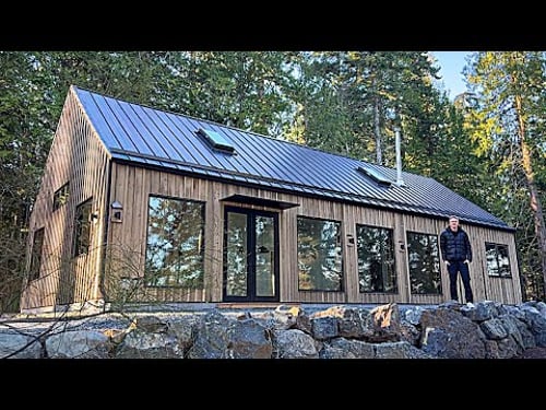 Inside the 1,350 square foot Prefab Home that has 20’ Ceilings!!