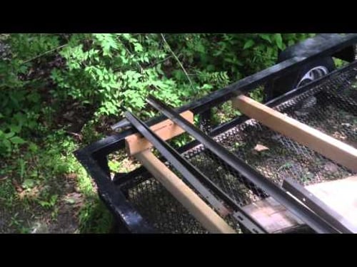 Surfacing A Split Log On A Utility Trailer Jig