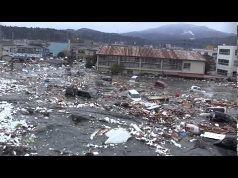 Tsunami in Kesennuma city, ascending the Okawa river