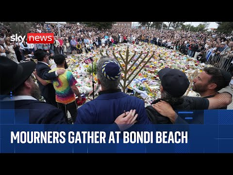 Mourners gather at Bondi Beach after terror attack