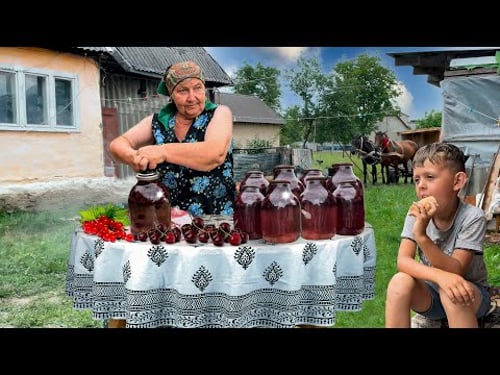 Life elderly couple in the Carpathian valley. Grandma preserves compote for the winter