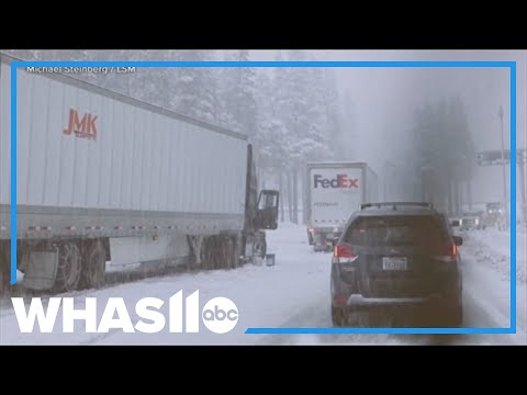 Winter storms disrupt holiday travel on both U.S. coasts
