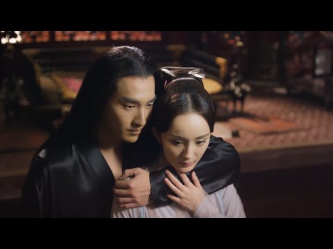 The wife looks at her husband who pretends to be strong. She is sad, but support him silently only