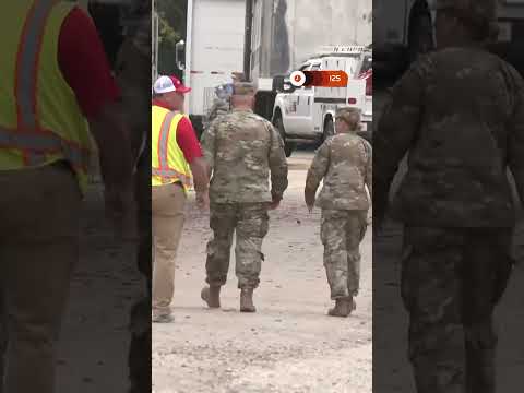 National Guard troops arrive at army base near Chicago