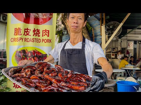 A humble roadside stall in Kuala Lumpur hides authentic and delicious roast meat and noodle dishes