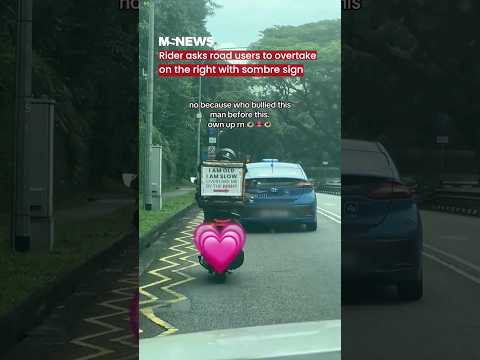 Rider asks road users to overtake on the right with sombre sign