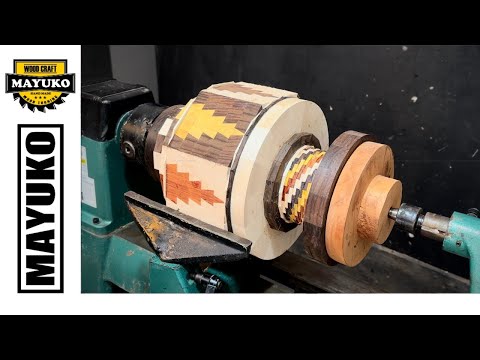 A VASE WITH A CHRISTMAS TREE MOTIF, woodturning