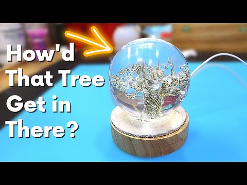 People Are Amazed At How The Tree Gets in The Resin Ball.