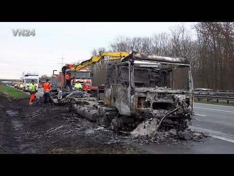 VN24 - Burnt-out MAN truck is recovered on the A2 highway near Hamm