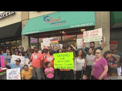 Pro-Haitian supporters gather ahead of Trump rally