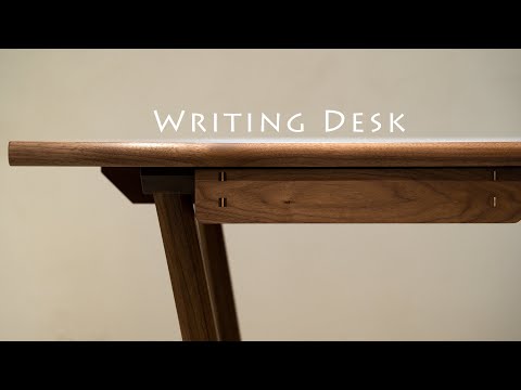 A Vintage Desk Building with Elegant Inward-Angled Legs