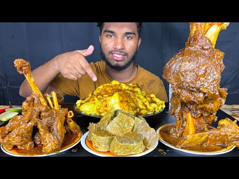 spicy mutton curry , goat lungs curry, buffalo leg curry and mutton fatty oil curry with rice eating