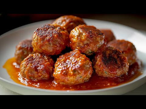 The most tender meatballs in tomato sauce - a delight in every spoon! Cheap and easy!