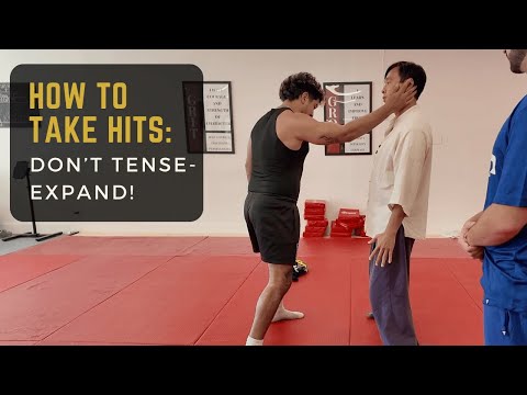 How Tai Chi Absorbs a Hit: Expanding Instead of Tensing