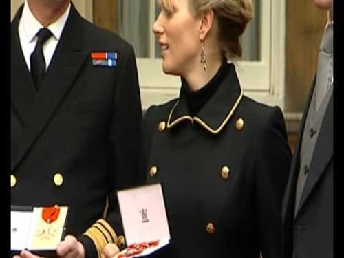 Zara Phillips and Mike Tindall after receiving MBE