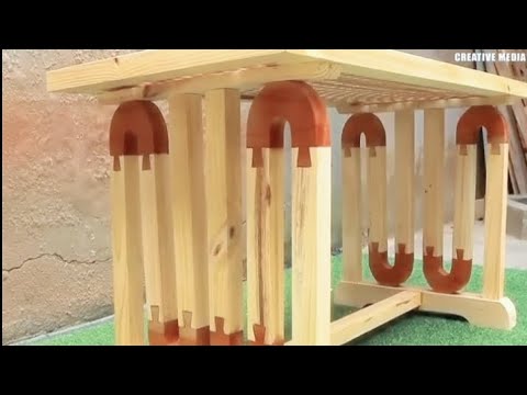 The skillful hands of The old carpenter's build a unique tea table