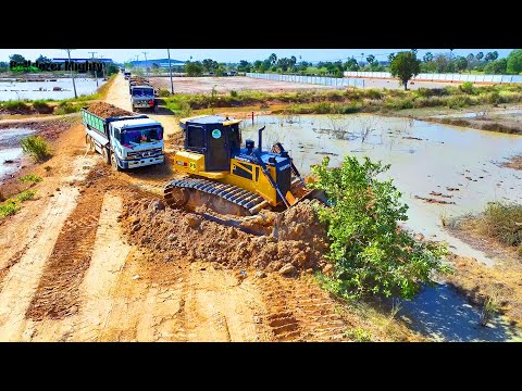 Skills Driver Bulldozer SHANTUI DH17C3 Working, Processing Filling Up The Land huge, Dump truck