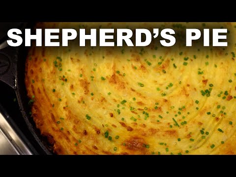 Shepherd's Pie in a cast iron pan | lamb and peas filling, cheesy potato topping