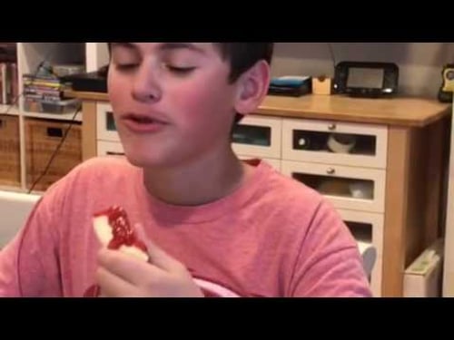 Kid Eats Banana With Ketchup