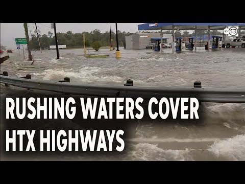 Raging water covering Eastex Fwy, Grand Pkwy