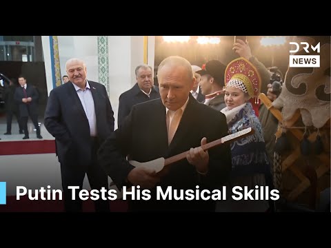 Unexpected Moment: Putin Tries His Hand at the Kyrgyz Komuz During State Visit | DRM News | AC1F