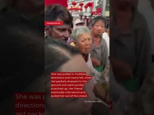 Woman in Malaysia nearly trampled after handing out red packets at Penang temple
