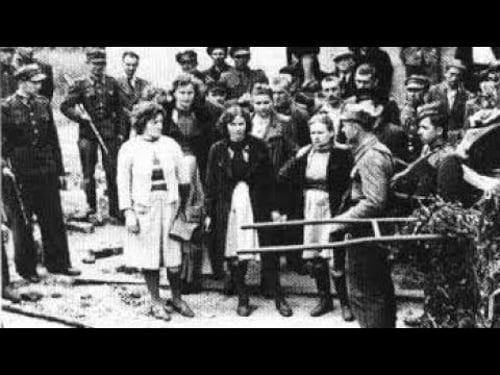 Execution of Stutthof camp female guards crowd cheer as nazis hanged by short-drop