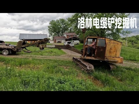 男人在户外发现一台荒废多年的洛林电缆铲挖掘机,看男人如何将其修复