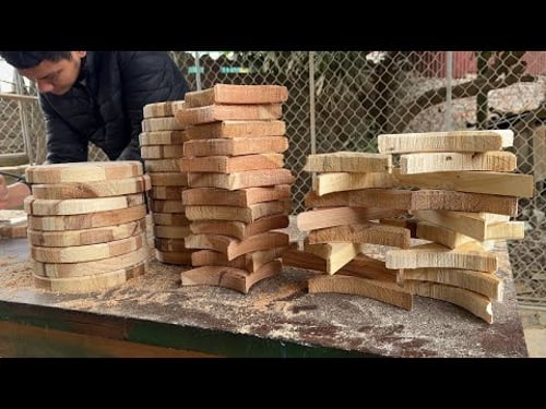 Building A Table From Discarded Wooden Slats. The Woodworking Skills Of The Young Carpenter.