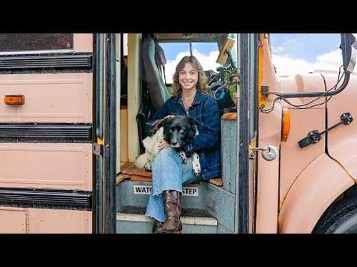 The cutest tiny home ever is inside of a pink school bus