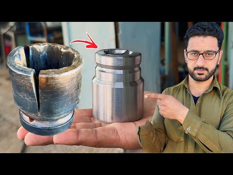 Expert mechanic demonstrates the process on a lathe to bring a broken air impact socket back to life