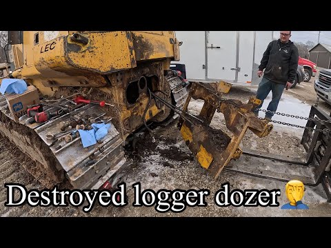 Major destruction on a Deere 700J logging dozer. Broken parts everywhere. Can we fix it?