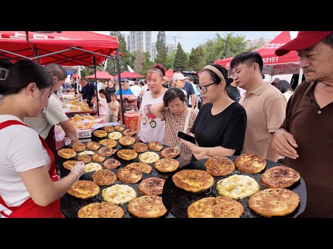 山西太原人民早餐吃什么,每天只开3个小时的太原早市,名气小吃摊黄,北方人民最爱的烧饼,外酥里糯的黄油糕,糖油饼,皮薄馅大的韭菜盒子,热气腾腾的羊肉汤和牛头菜,中国名小吃驴打滚,平遥碗托,内蒙桌山熏鸡