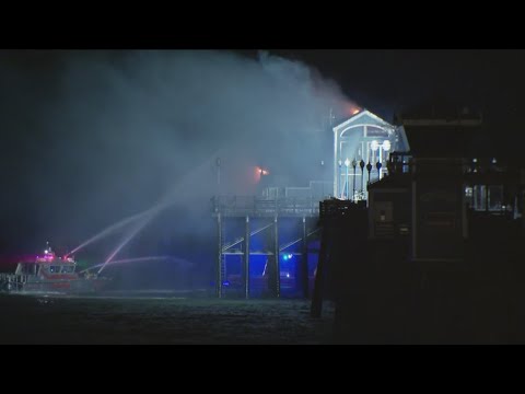 Fire crews contain spread of massive fire that erupted on historic Oceanside Pier | 11 p.m. update