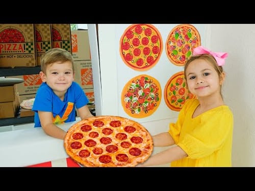 Kinder lernen, Pizza zu kochen und sich gegenseitig zu helfen