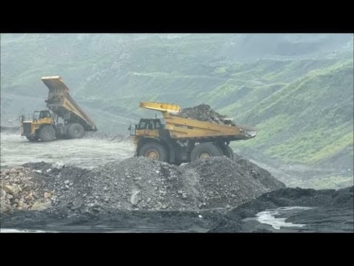 Extreme Mining Dump Trucks Working Hard – Heavy Machinery Power at the Mine
