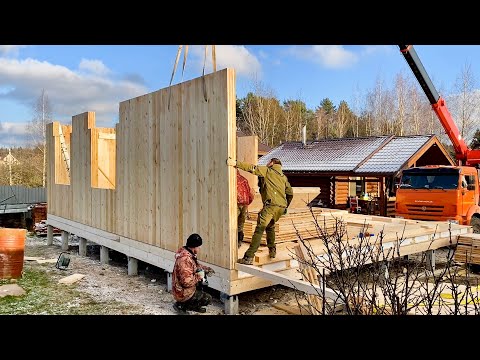 Building of a house out of large wooden panels | Step-by-step guide