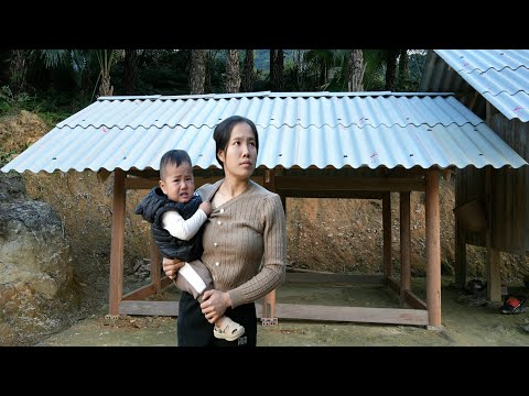 Single mother and baby build a new kitchen, using skillful hands to build a beautiful house