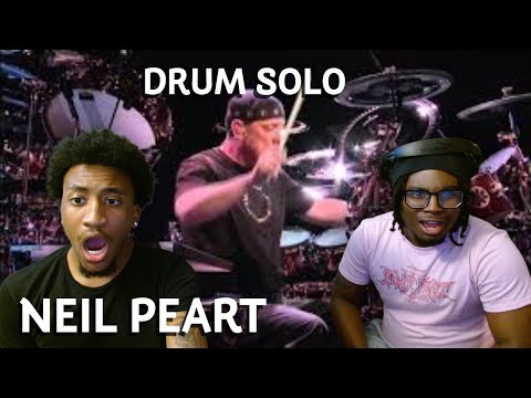 REACTING TO NEIL PEART'S INSANE DRUM SOLO!!