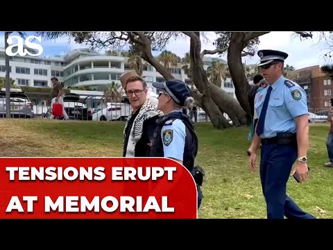 Man wearing Keffiyeh REMOVED from BONDI BEACH MEMORIAL after Hanukkah shooting